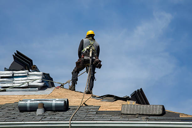 Professional Roof Replacement technician working in Levittown, PA
